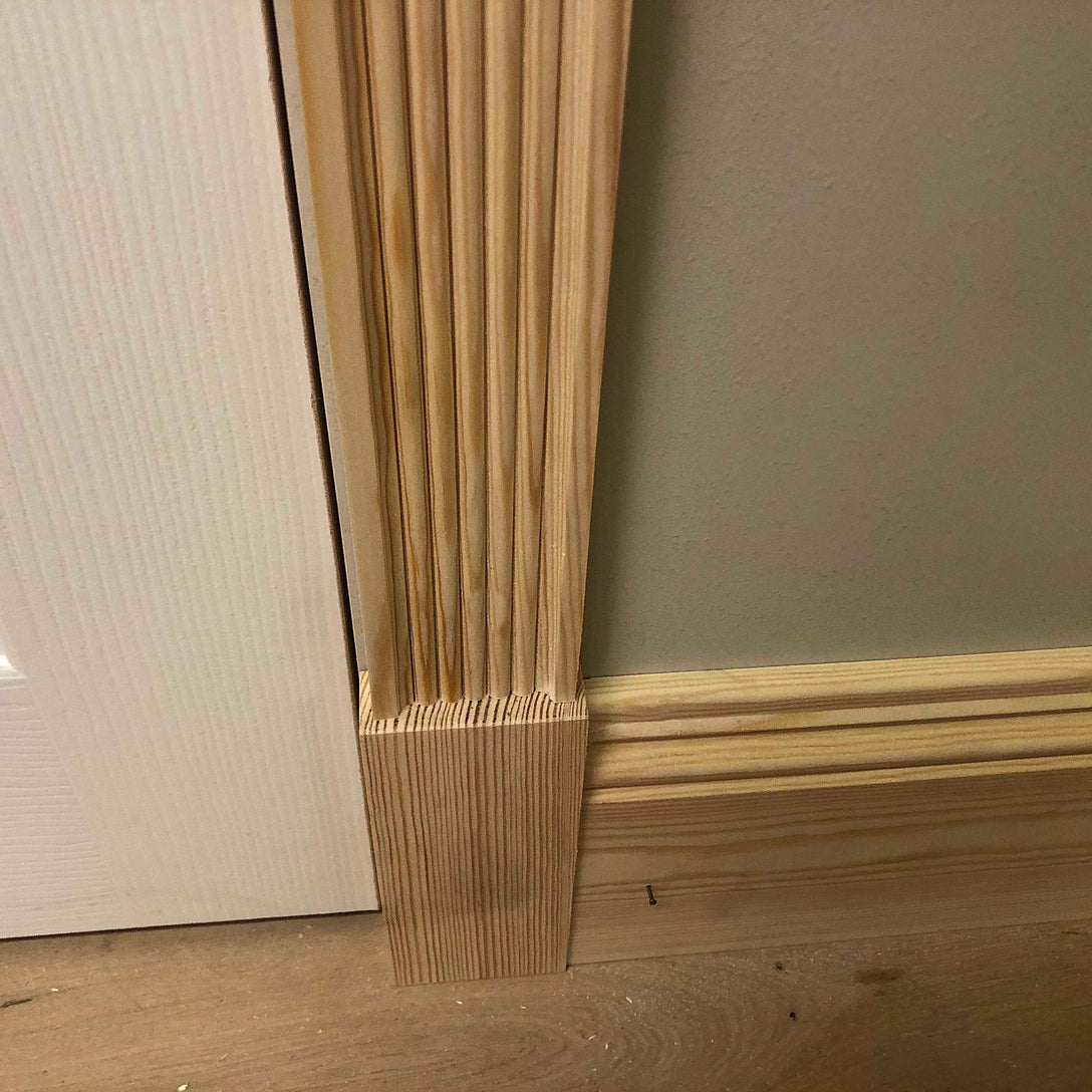 Victorian reeded pine Architrave shown meeting skirting board at bottom of door 67mm x 20mm 