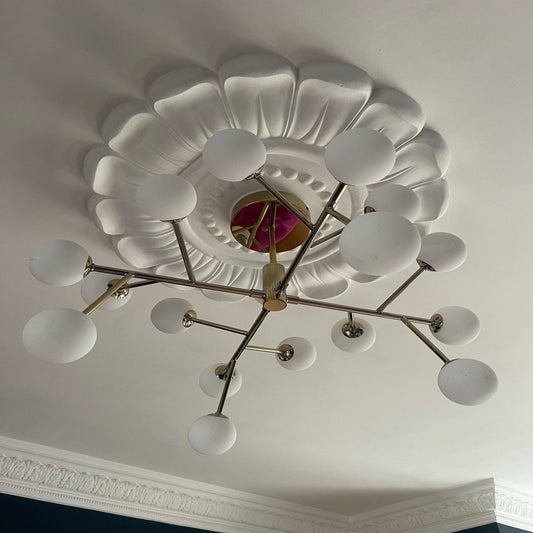 Petal Design Ceiling Rose in naturally lit room