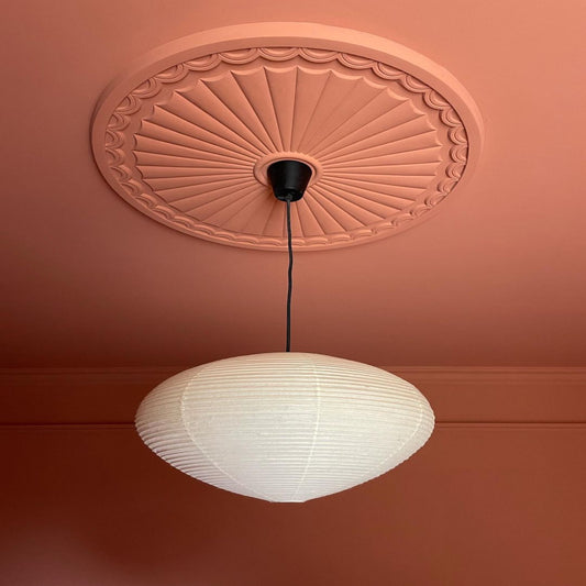 photo of adams sunburst plaster ceiling rose fitted in pink room