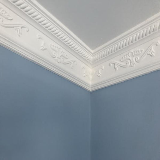 Decorated coving in corner