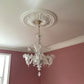 Ornate Floral Plaster Ceiling Rose in pink room