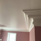 Victorian Swan Neck cornice in warm coloured room