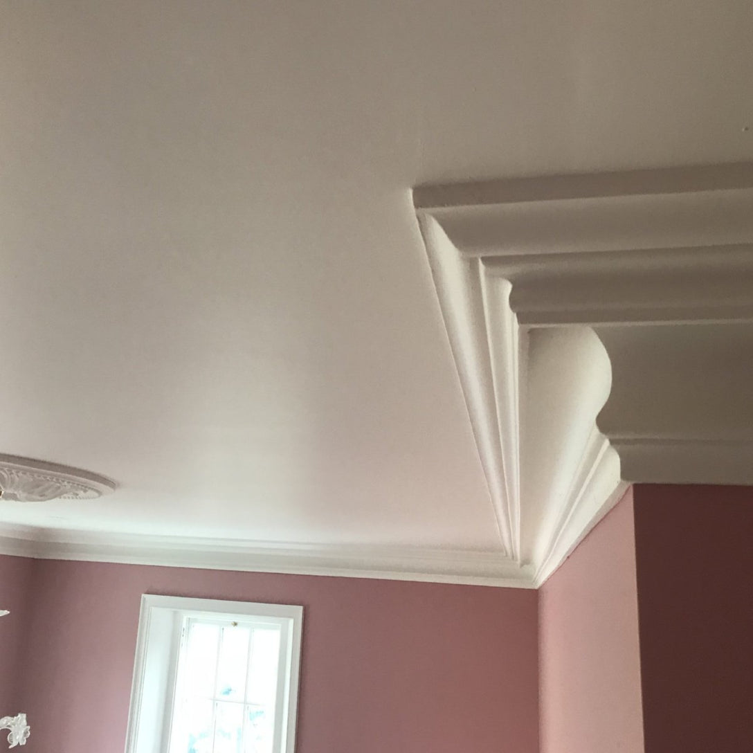 Victorian Swan Neck cornice in warm coloured room