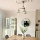 Large Sunflower Ceiling Rose in well-lit dining room