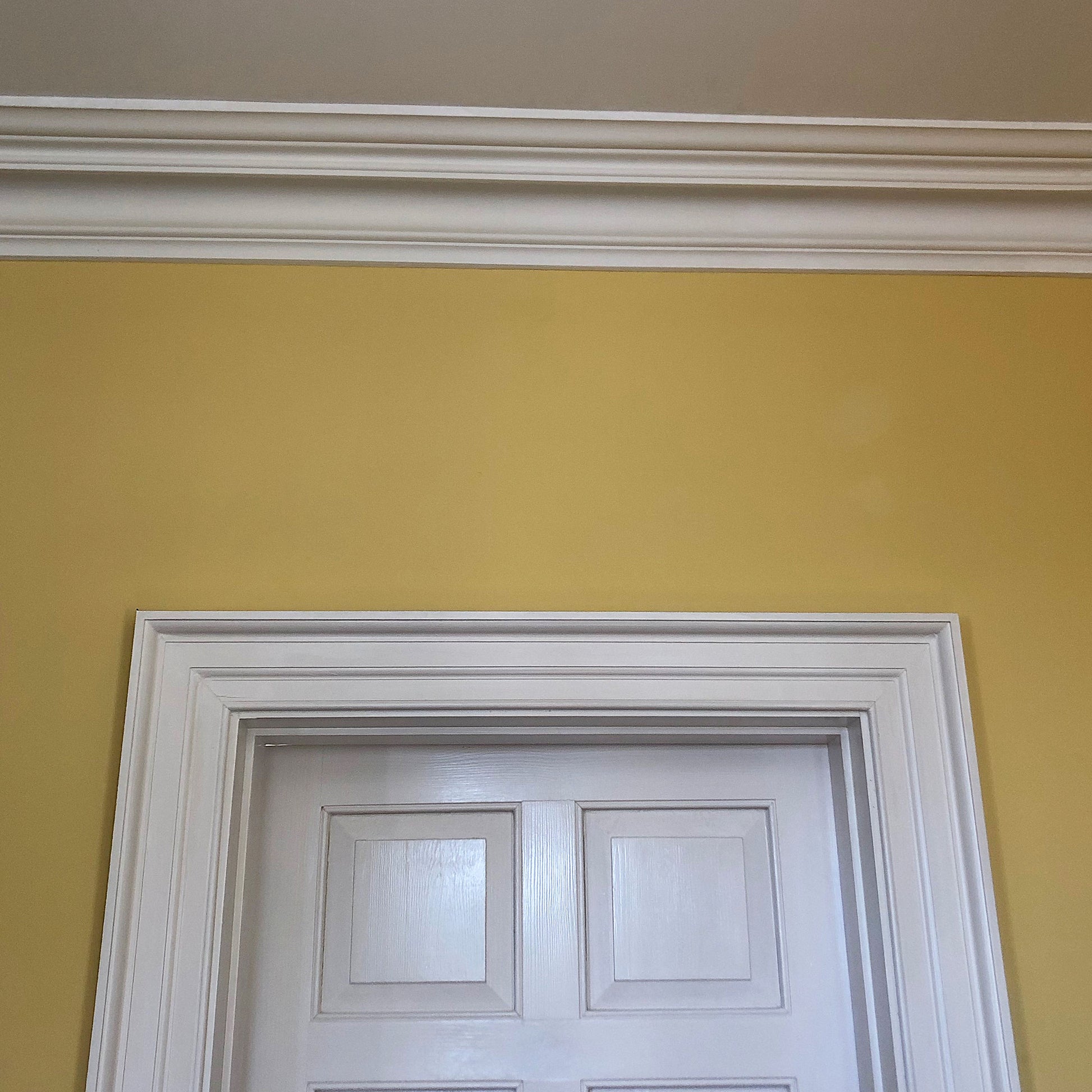 Victorian Swan Neck cornice above doorway