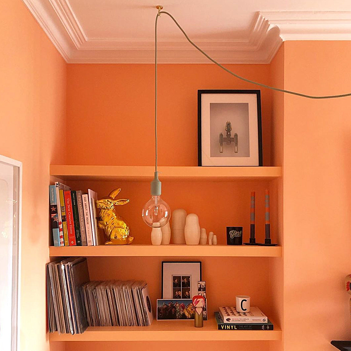 photo of Swan Neck Plaster Coving fitted in bright room over shelving 125mm 