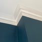 Traditional Victorian Paster Coving shown in a blue room 150MM 