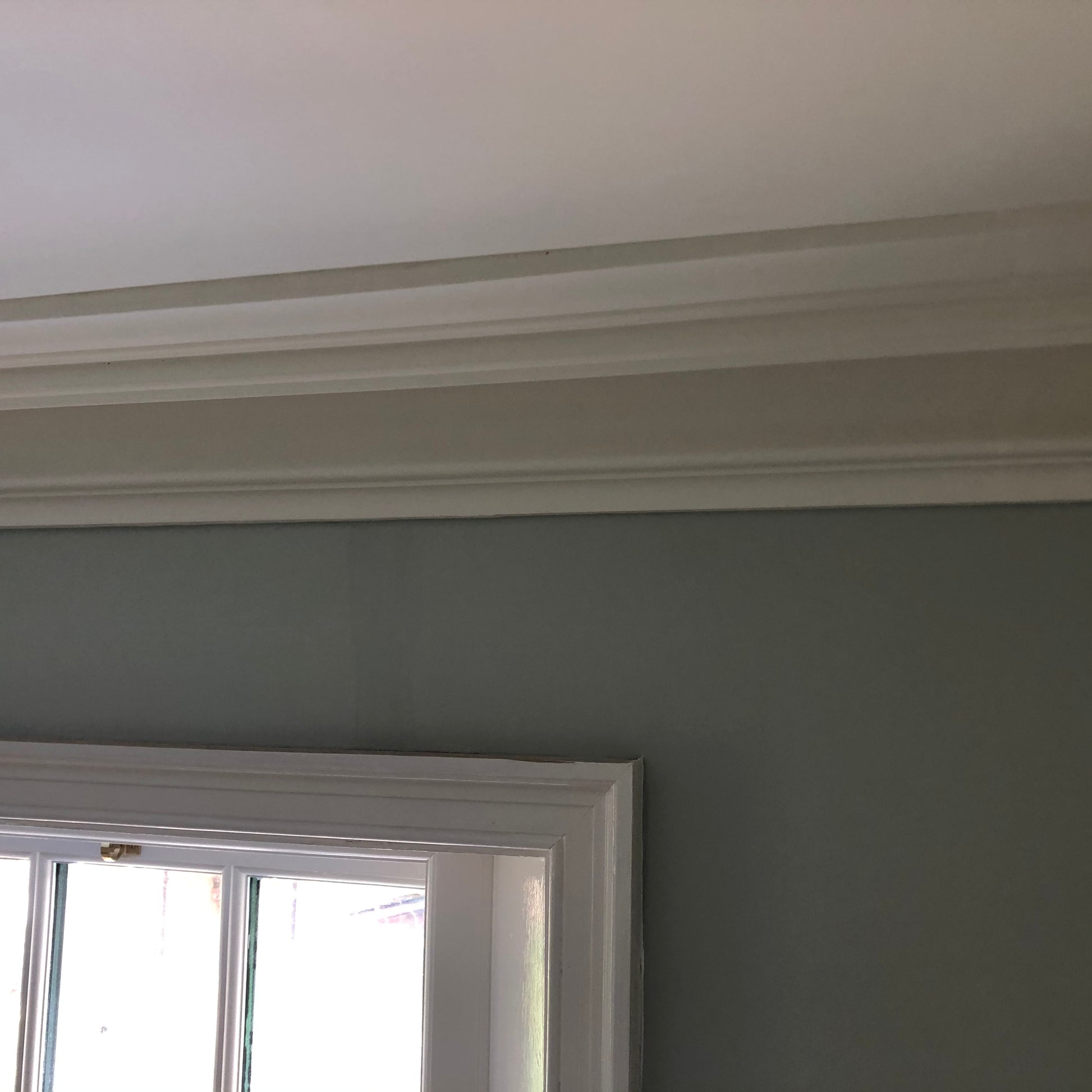 Victorian Swan Neck cornice in natural lighting