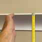 section of Plaster Coving with measuring tape for scale - 100mm Drop