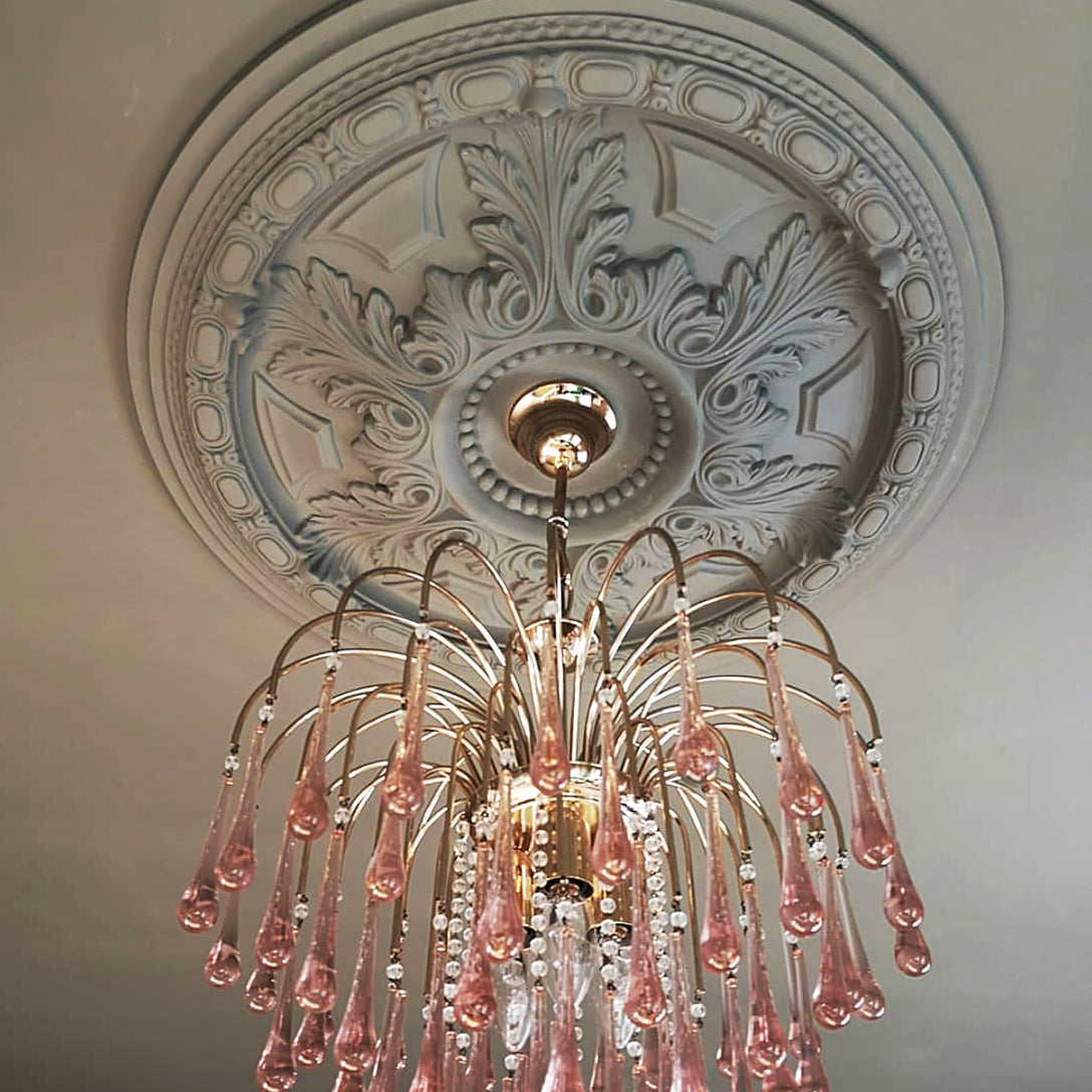 Large Acanthus Leaf Plaster Ceiling Rose in warm lighting