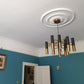 Large Sunflower Ceiling Rose in teal coloured room