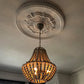 Palmette & Rope Plaster Ceiling Rose in warm lighting