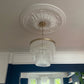 Ornate Floral Plaster Ceiling Rose with traditional light fitting