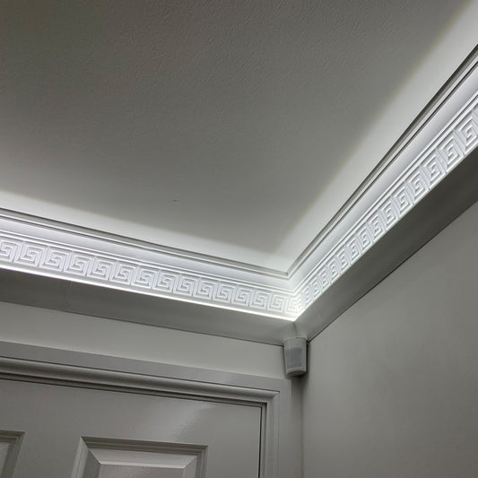 Greek Key cornice in well-lit living room