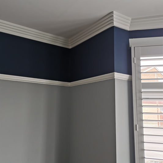 image of Art Deco Four Step plaster coving in a blue living room - 100mm 