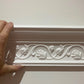 Flowers cornice in-hand display