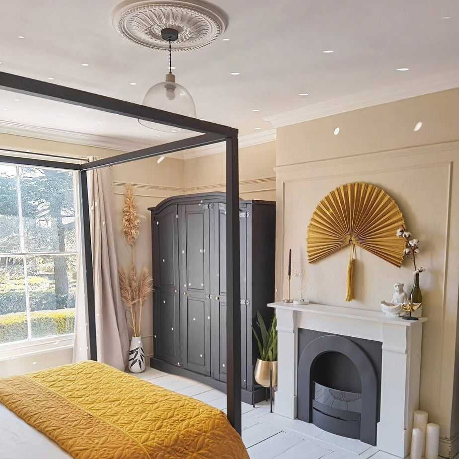 Ogee plaster cornice in bedroom with large window