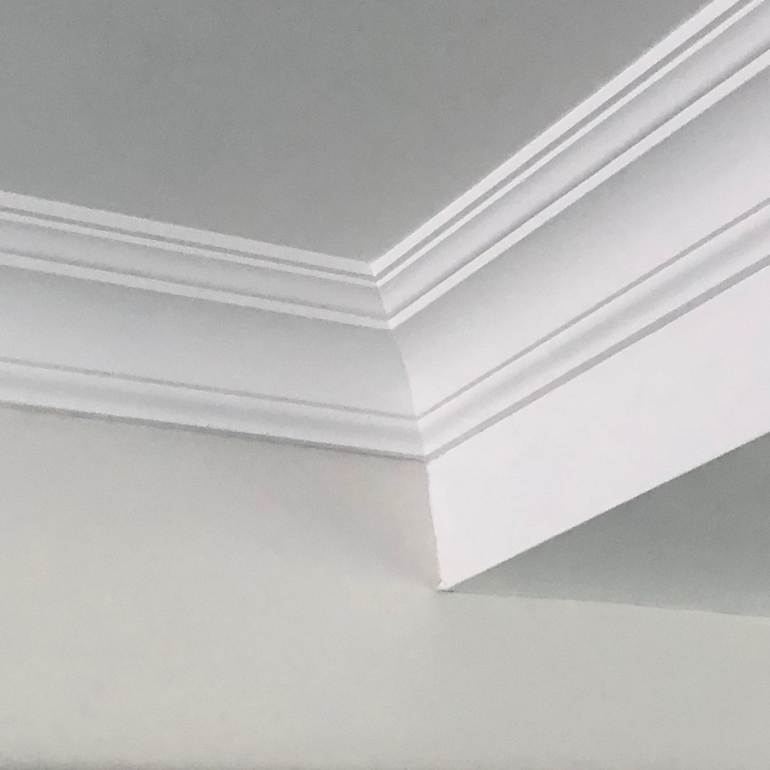 Plaster Coving Classic shown in a white room 90mm Drop 