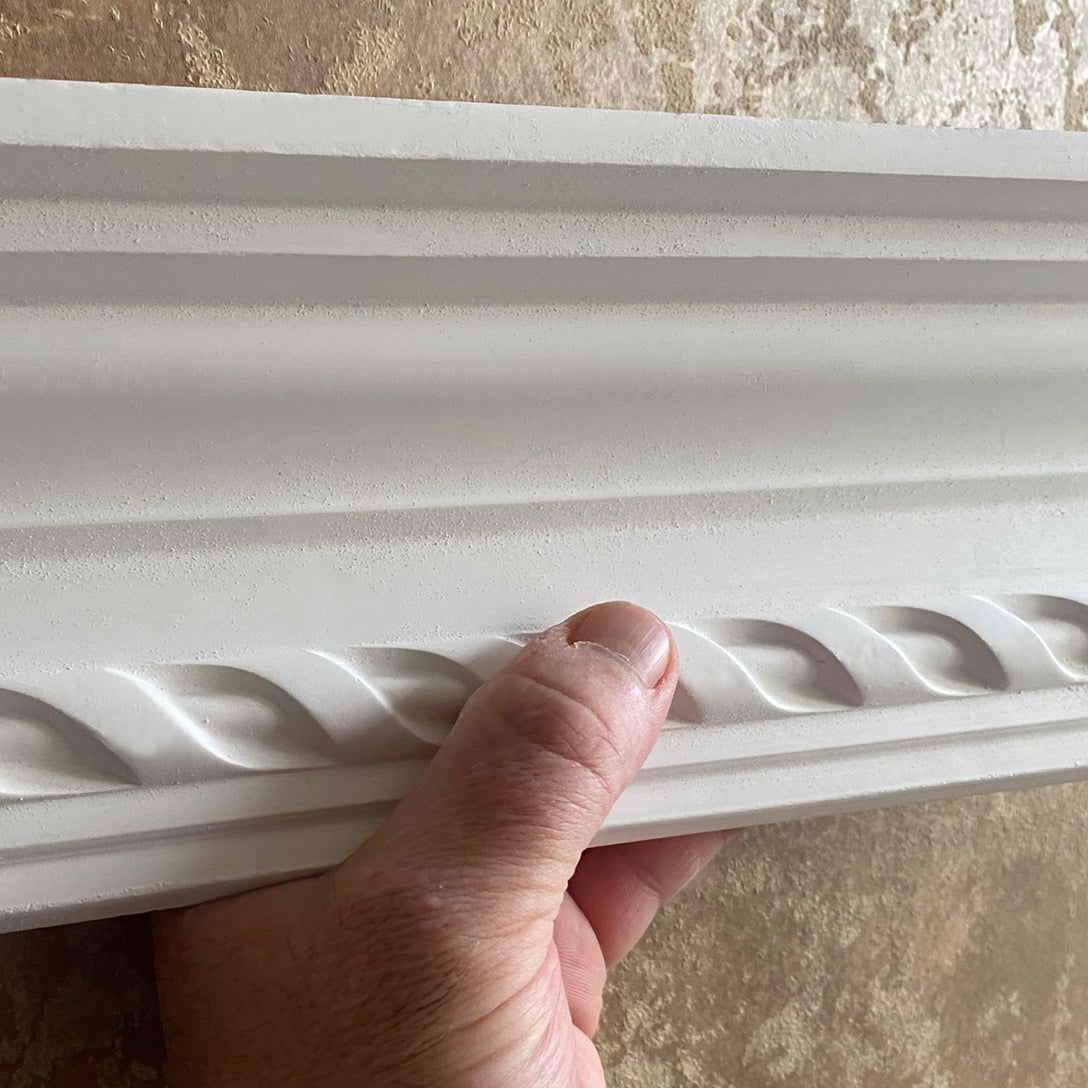 Astragal Plaster Coving in hand - 80mm Drop 