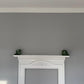 Dentil cornice above fireplace