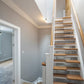 Egg & Dart coving in hallway near stairs