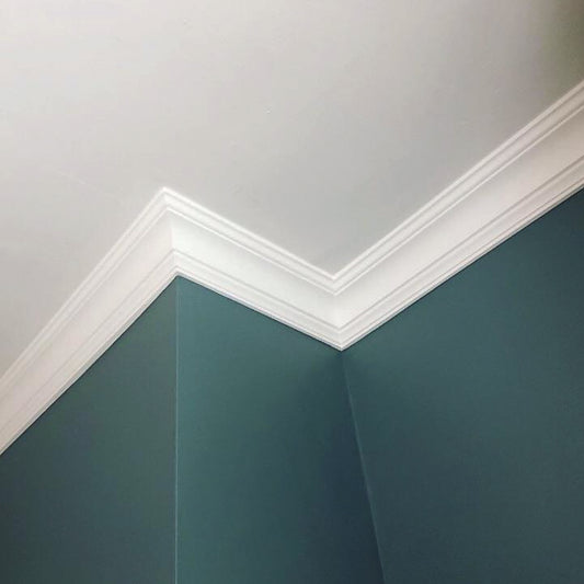 classic Plaster Coving shown against a teal wall - 90mm Drop