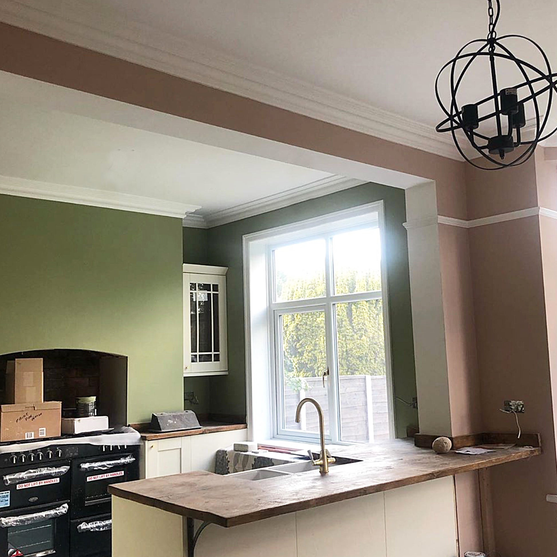 example photo showing swan neck plaster coving fitted in kitchen - 100mm