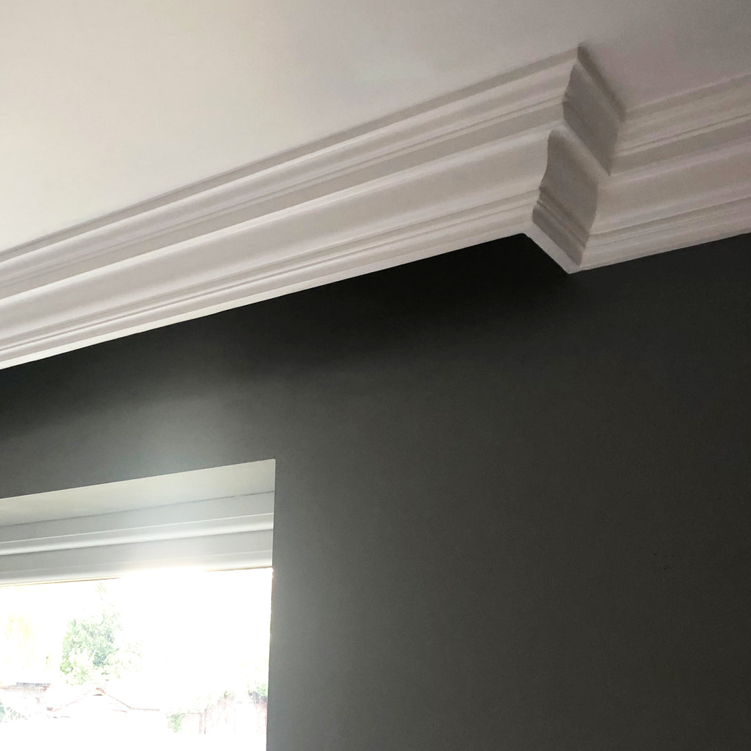 Regency Medium coving against dark grey well