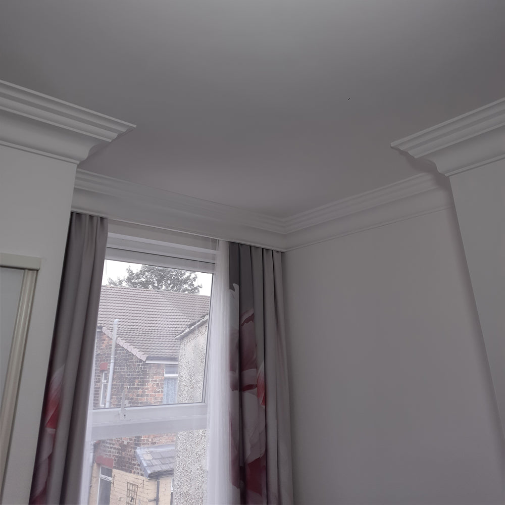 image showing victorian plaster coving fitted around curtain rail