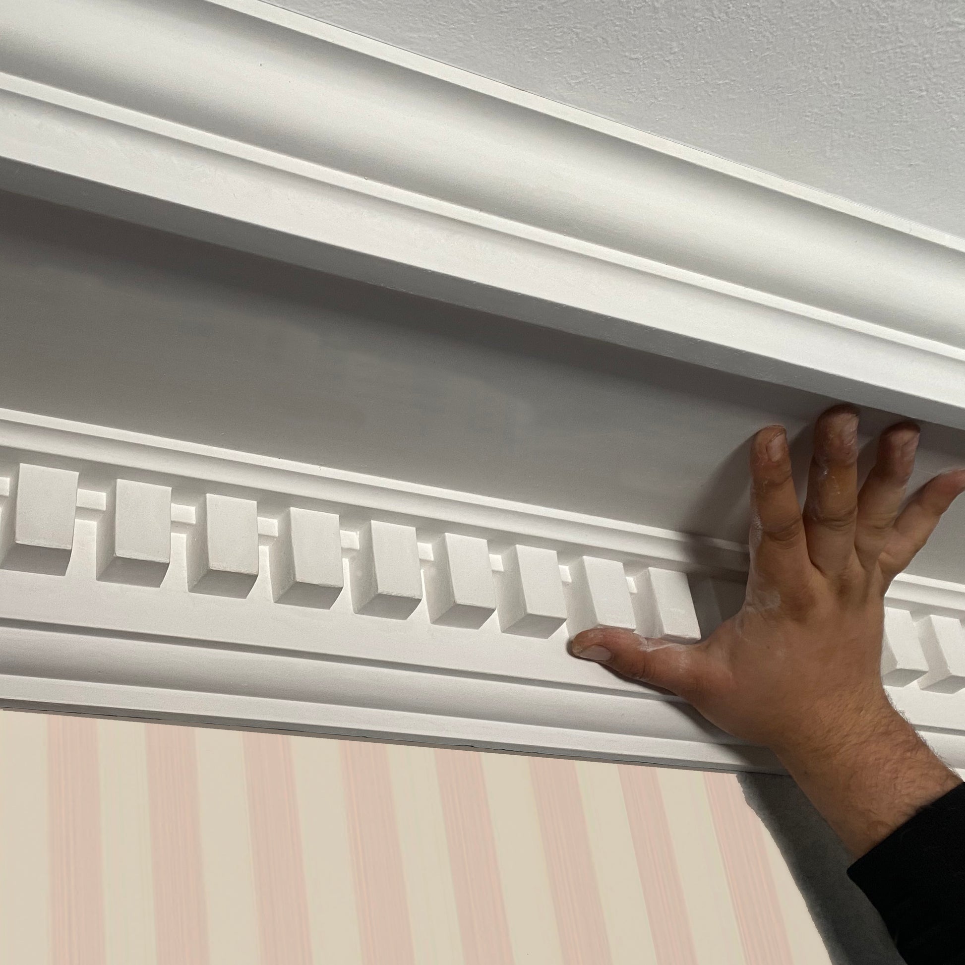 Large Dental Plaster Cornice shown against striped wallpaper - Drop 165MM