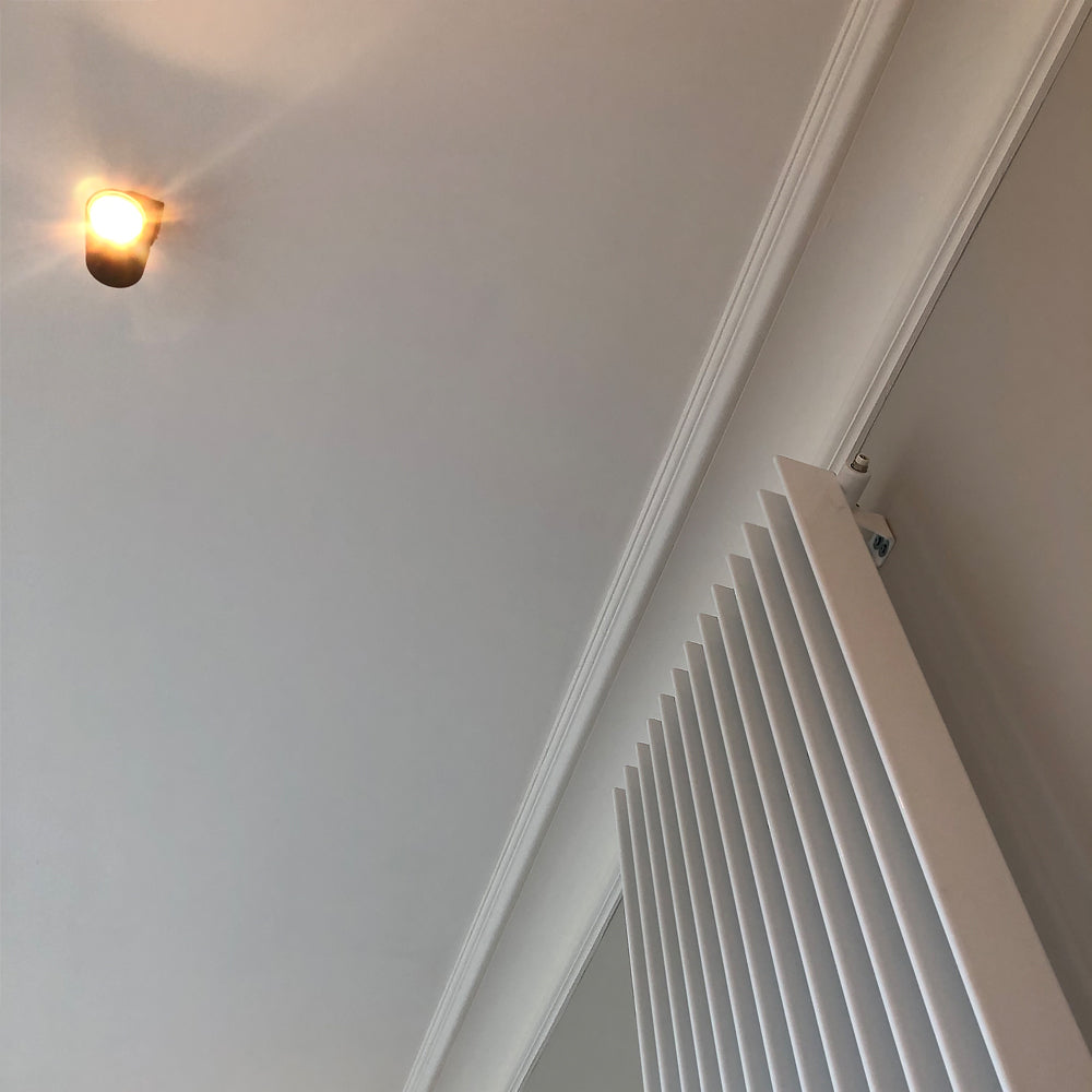 Showing Victorian style Plain Coving on a grey wall- 100MM