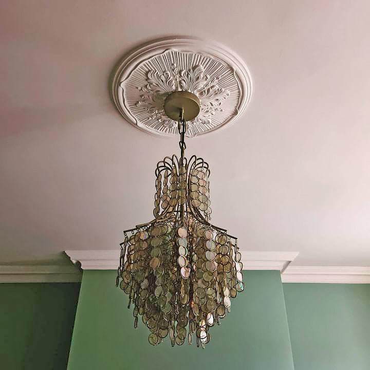 photo showing acanthus plaster ceiling rose fitted with chandelier 510mm