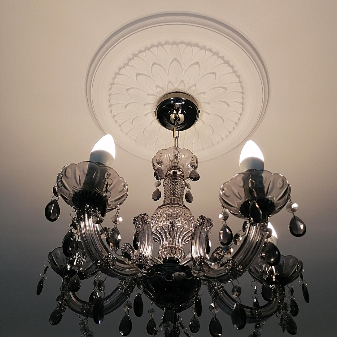 Victorian Floral Plaster Ceiling Rose in warm lighting