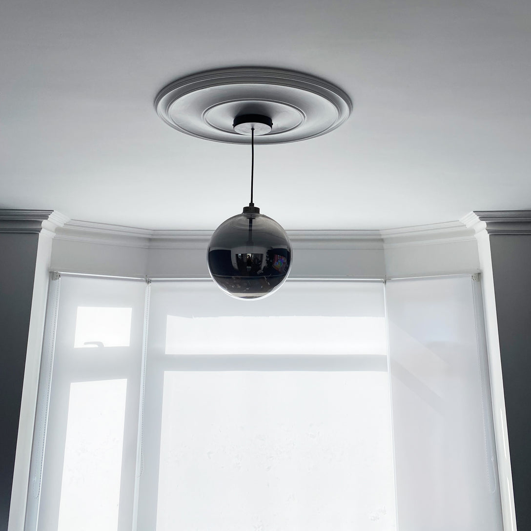 Plain Spun Plaster Ceiling Rose opposite large window