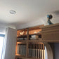 Dentil cornice in furnished dining room