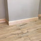 photo of lambs tongue skirting board fitted around chimney breast