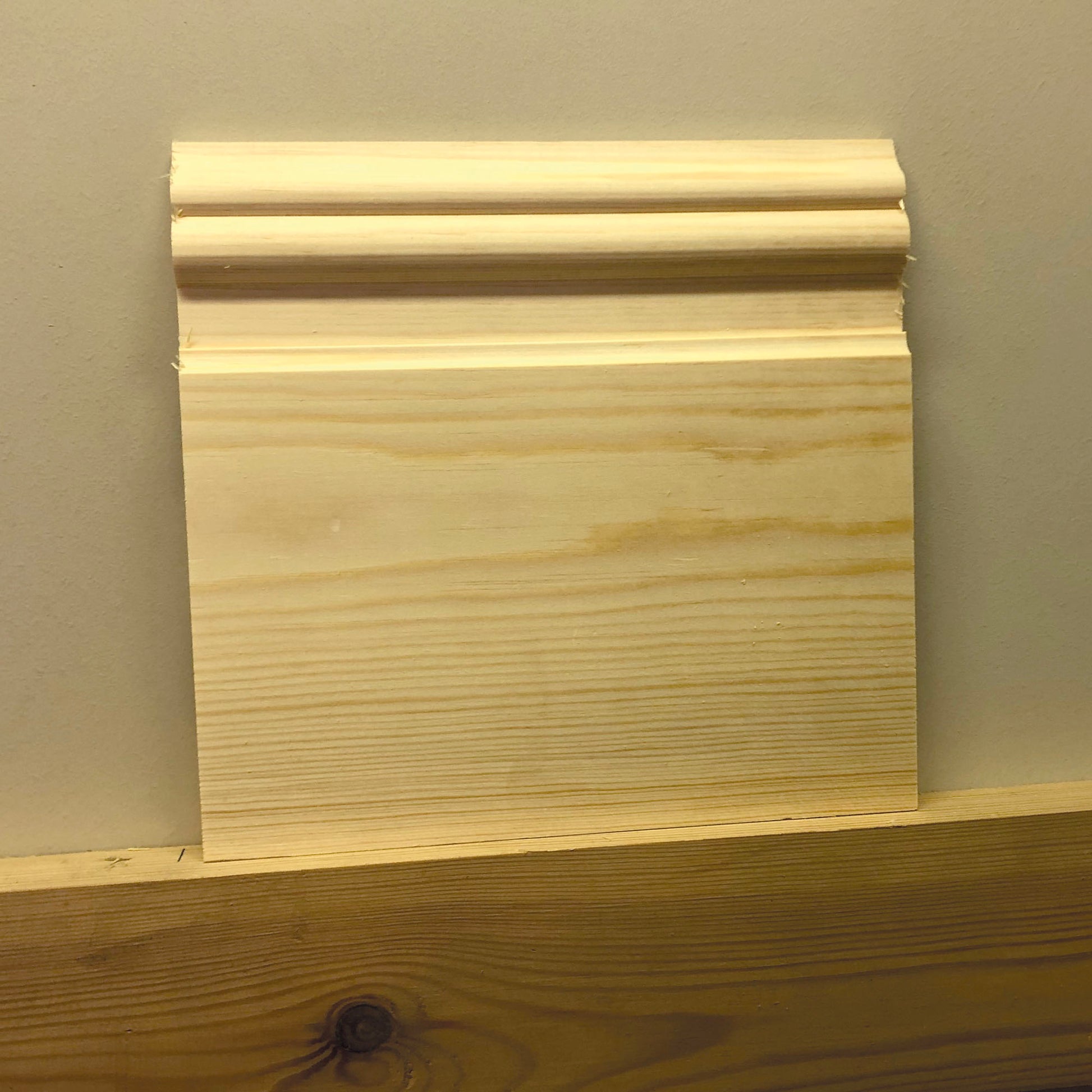 small cut-off section of Nine Inch timber Skirting Board 215mm x 21mm 