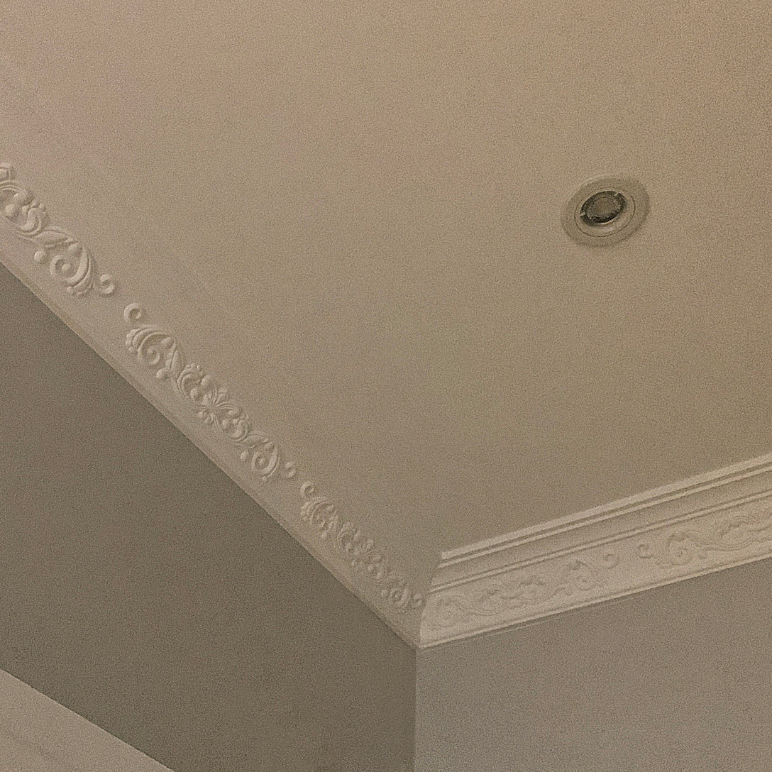 Fleur de Lys coving in warm lighting