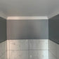 Dentil coving in bathroom setting
