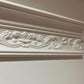 Fleur de Lys cornice details in well-lit room