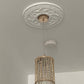 Small Acanthus Rings Plaster Ceiling Rose in natural lighting