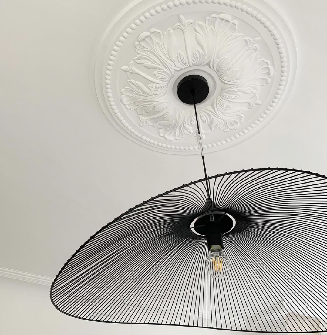 Ornate Floral Plaster Ceiling Rose with modern light fitting