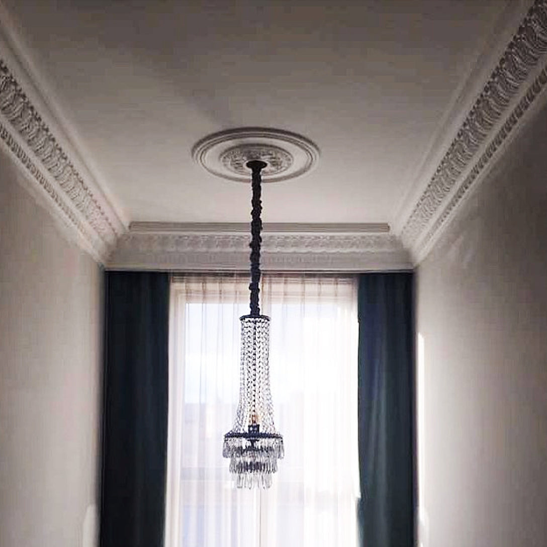 victorian Plaster Coving shown in hallway with chandelier 235mm Drop 