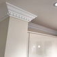 Dentil coving in well-lit kitchen