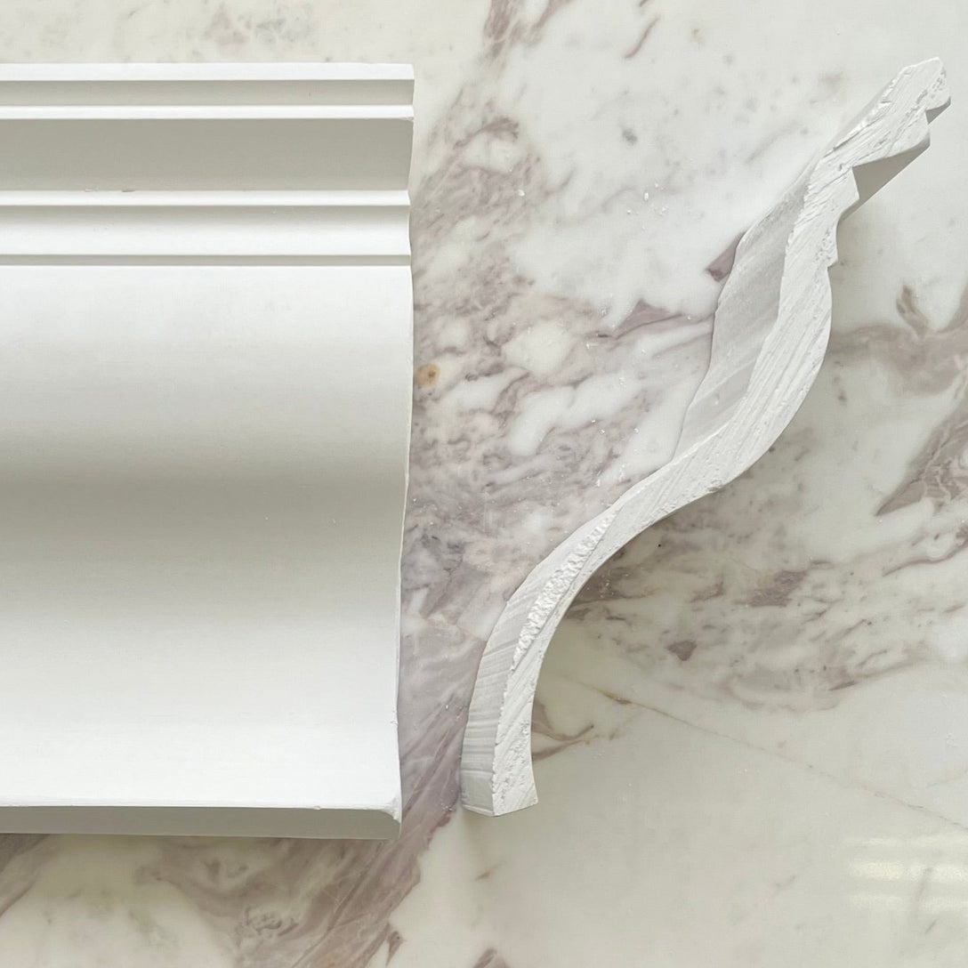 200MM Victorian Ogee Cornice shown against marble wall