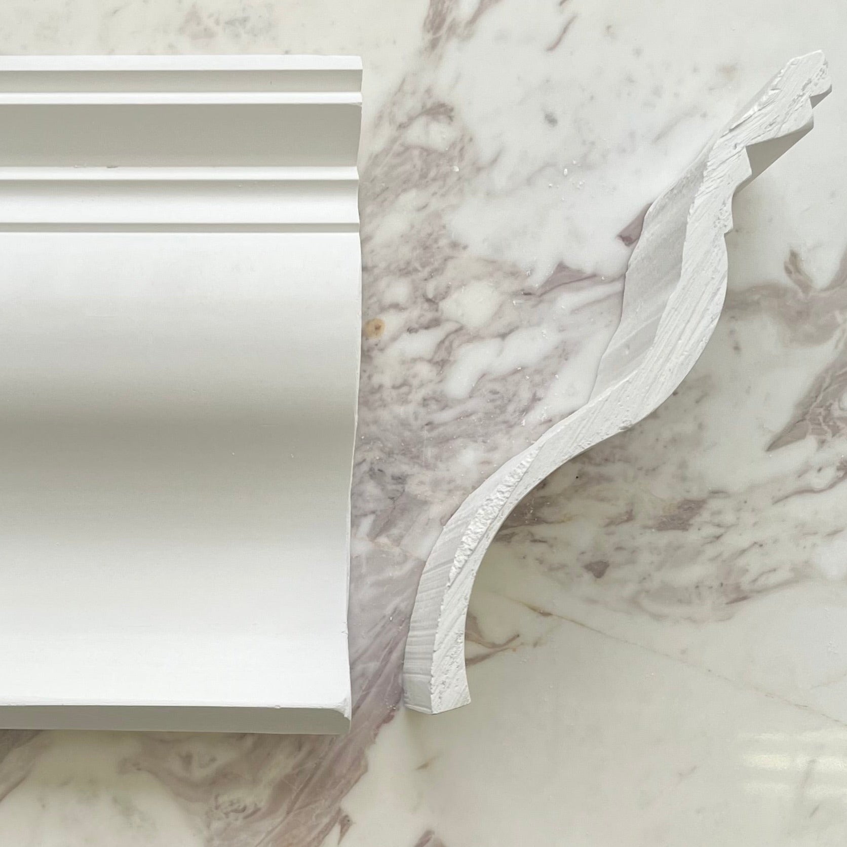 200MM Victorian Ogee Cornice shown against marble wall